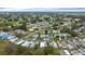 Scenic aerial view of a vibrant residential community with tree-lined streets and lush landscaping at 1541 Hillcrest Dr, Lady Lake, FL 32159