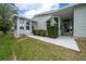 Home exterior featuring a covered entrance and manicured hedges at 1541 Hillcrest Dr, Lady Lake, FL 32159