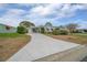 Inviting single-story home featuring a covered entrance and meticulous landscaping at 1541 Hillcrest Dr, Lady Lake, FL 32159