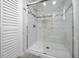 Modern shower boasting marble tiles, glass enclosure, and sleek fixtures at 1541 Hillcrest Dr, Lady Lake, FL 32159