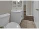 Bathroom with sleek vanity, updated fixtures, and tile flooring at 18 Juniper Pass Crse, Ocala, FL 34480