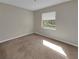 Cozy bedroom with natural light streaming through the window at 18 Juniper Pass Crse, Ocala, FL 34480