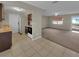 Open kitchen with tile flooring leading to the living area at 18 Juniper Pass Crse, Ocala, FL 34480