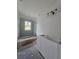 Bathroom featuring a window, vanity, and partially installed shower, ready for personalization at 19 Bay Court Pass, Ocklawaha, FL 32179