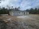 Single story home with an attached garage at 19 Bay Court Pass, Ocklawaha, FL 32179