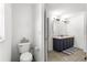 Bathroom featuring toilet and double sink vanity at 29 Guava Pass, Ocklawaha, FL 32179