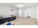 Spacious bedroom featuring a bed, ceiling fan and ensuite bathroom at 29 Guava Pass, Ocklawaha, FL 32179