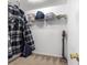 Walk-in closet with shelving and carpet flooring at 29 Guava Pass, Ocklawaha, FL 32179