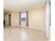 Spacious bedroom with neutral walls, tile flooring, window with curtains and a closet at 434 Bar Ct, Kissimmee, FL 34759