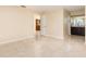 Bedroom featuring tile floors with views into the kitchen and bathroom at 434 Bar Ct, Kissimmee, FL 34759