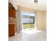 Bright dining area with sliding glass doors leading to the backyard at 434 Bar Ct, Kissimmee, FL 34759