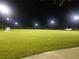 Community soccer field is illuminated at night for evening play or practices at 434 Bar Ct, Kissimmee, FL 34759