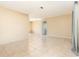 Open living room with tile flooring, neutral walls, and plenty of natural light at 434 Bar Ct, Kissimmee, FL 34759