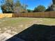 Wide backyard with a newly-installed wood fence at 4691 Se 138Th Pl, Summerfield, FL 34491