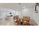 Open-concept dining area connected to the living room, showcasing the home's spacious layout at 506 Clear Rd, Ocala, FL 34472