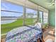 Sunroom with windows, ceiling fan, and scenic view at 527 Midway Dr # A, Ocala, FL 34472