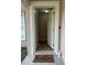 Inviting entryway featuring a new front door, decorative accents, and wood-look flooring at 5315 Se 26Th Ave, Ocala, FL 34480