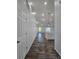 Bright hallway leading to the kitchen and living area at 5500 Sw 151St Street Rd, Ocala, FL 34473