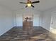 View from Living Room into Kitchen with double doors at 5500 Sw 151St Street Rd, Ocala, FL 34473