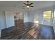 View from Living Room into Kitchen with double doors and exterior door and window at 5500 Sw 151St Street Rd, Ocala, FL 34473