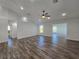 Living Room with hardwood floors and views into other rooms at 5500 Sw 151St Street Rd, Ocala, FL 34473