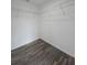 Empty walk-in closet with shelving and wood-look flooring at 5500 Sw 151St Street Rd, Ocala, FL 34473