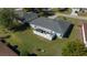 Aerial view of home featuring a backyard patio with white privacy fence at 6196 Sw 84Th Place Rd, Ocala, FL 34476