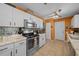 Functional kitchen features stainless steel appliances and ample countertop space at 6196 Sw 84Th Place Rd, Ocala, FL 34476