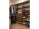 Well-organized closet features hanging racks, shelves, and drawers for optimal storage at 6367 Sw 70Th Cir, Ocala, FL 34474