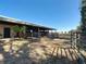 Exterior view of barn with stalls, fencing and field access at 7688 Se 135Th St, Summerfield, FL 34491