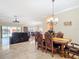 Open-concept dining area adjacent to the living room, perfect for entertaining and Gathering gatherings at 7688 Se 135Th St, Summerfield, FL 34491