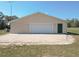 Detached garage with ample parking space and convenient side entry at 7688 Se 135Th St, Summerfield, FL 34491