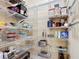 Organized pantry with ample shelving for storage of food items and kitchen essentials at 7688 Se 135Th St, Summerfield, FL 34491