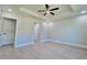 Spacious bedroom features a ceiling fan, recessed lighting and neutral color paint at 8295 Se 159Th Ln, Summerfield, FL 34491