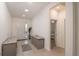 Bright foyer featuring tiled floors, a skylight, and stylish decor at 8532 Sw 79Th Ave, Ocala, FL 34481