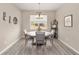 Cozy dining room with table and chairs, featuring a window with a view of the outdoor scenery at 8874 Sw 104Th Cir, Ocala, FL 34481