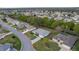 This aerial view showcases the home's landscaped yard and neighborhood, with the property lines highlighted in red at 9033 Se 136Th Loop, Summerfield, FL 34491