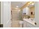 Clean bathroom with a shower and bathtub combination, toilet, and white vanity at 9126 Sw 102Nd Cir, Ocala, FL 34481