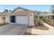 Charming single-story home featuring a well-manicured lawn and a white garage door with decorative windows at 9126 Sw 102Nd Cir, Ocala, FL 34481