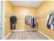 An oversized walk-in closet features built-in wire shelving at 9399 Sw 106Th Ave, Ocala, FL 34481