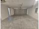 Clean garage with garage door, entry door and plenty of space for two cars at 96 Fisher Way Trl, Ocklawaha, FL 32179
