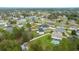 Aerial view of a Gathering-friendly neighborhood showing well-maintained lawns and mature trees at 11684 Sw 56Th Ter, Ocala, FL 34476