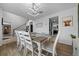 Bright dining room with a farmhouse-style table, decor, and natural light at 11684 Sw 56Th Ter, Ocala, FL 34476