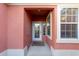 Close up of the front exterior with the decorative glass of the front door at 13625 Se 93Rd Court Rd, Summerfield, FL 34491