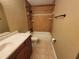 Cozy bathroom featuring a tiled shower/tub combination and vanity sink at 2211 Ne 45Th Ave, Ocala, FL 34470