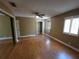 Bright bedroom with hardwood floors, plantation shutters and ample closet space at 2211 Ne 45Th Ave, Ocala, FL 34470