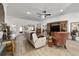 Bright living room with tiled floors, recessed lighting, and access to the patio at 3925 Ne 58Th Cir, Silver Springs, FL 34488