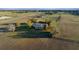 Aerial view of country home on acreage with mature trees and fencing at 6890 Nw 21St St, Ocala, FL 34482