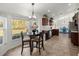 Breakfast nook with natural light and updated cabinets, sink, and stainless steel appliances at 7010 Nw 44Th Ave, Ocala, FL 34482