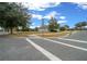 View of a corner lot house situated on a quiet street at 7151 Sw 96Th Ct, Ocala, FL 34481